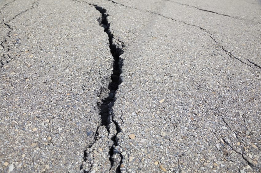 cracked asphalt paving